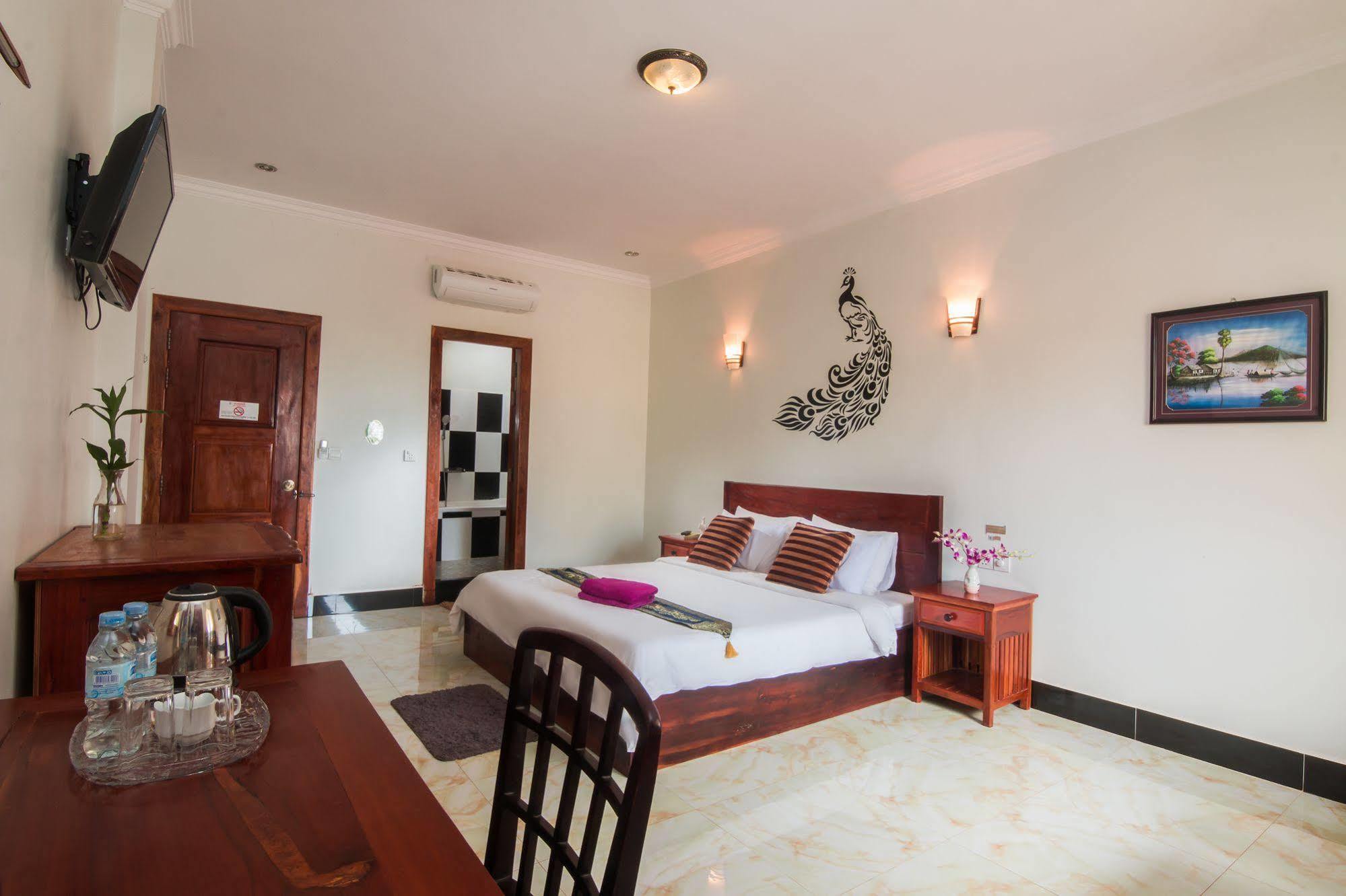Angkor Udom Guesthouse Siem Reap Esterno foto